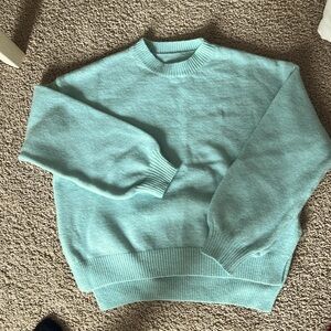 Women’s blue sweater